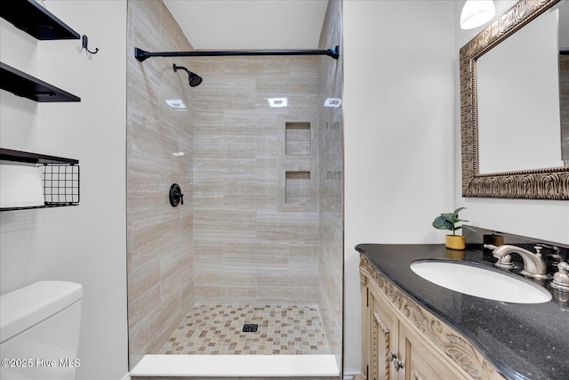 522 S Kerr Ave Unit 66, Wilmington, NC 28403 - bathroom with toilet, tiled shower, and vanity