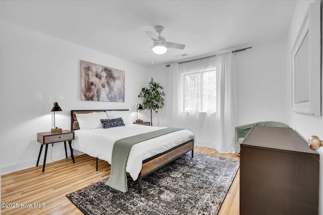522 S Kerr Ave Unit 66, Wilmington, NC 28403 - bedroom featuring light wood-style flooring, baseboards, and ceiling fan