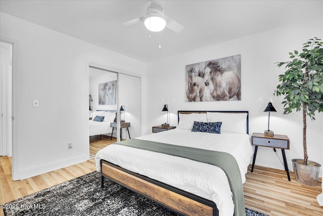 522 S Kerr Ave Unit 66, Wilmington, NC 28403 - bedroom featuring wood finished floors, baseboards, a closet, and a ceiling fan
