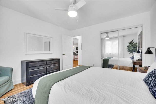 522 S Kerr Ave Unit 66, Wilmington, NC 28403 - bedroom featuring wood finished floors, a closet, a ceiling fan, and baseboards