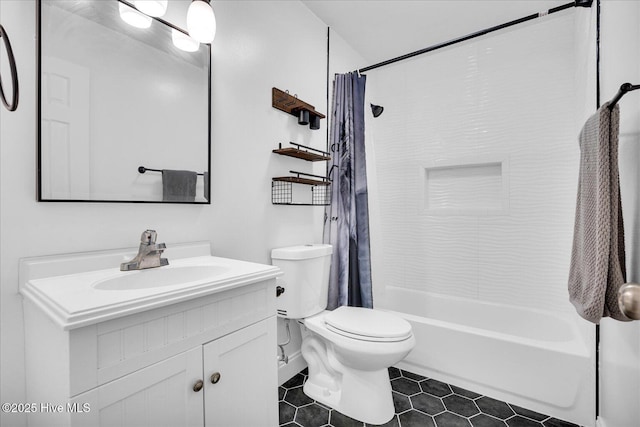 522 S Kerr Ave Unit 66, Wilmington, NC 28403 - full bath with tile patterned flooring, toilet, vanity, and shower / bathtub combination with curtain