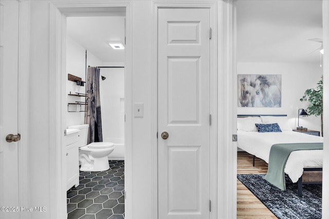 522 S Kerr Ave Unit 66, Wilmington, NC 28403 - bathroom featuring toilet, curtained shower, and tile patterned floors