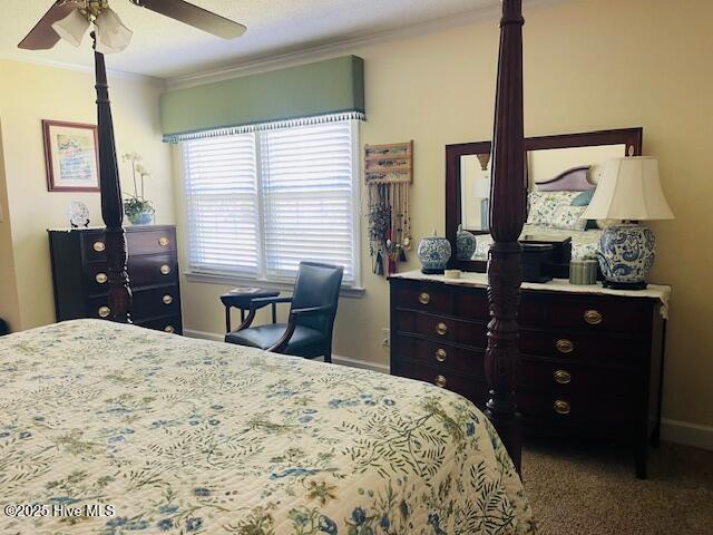 2008 Hardee Rd, Kinston, NC 28504 - bedroom featuring crown molding, baseboards, carpet, and a ceiling fan
