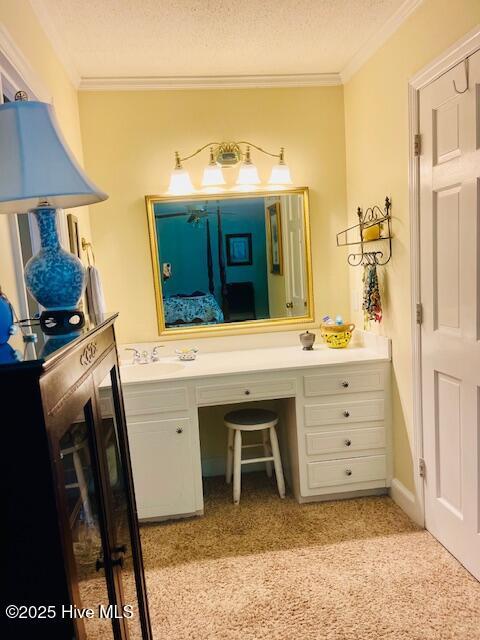 2008 Hardee Rd, Kinston, NC 28504 - ensuite bathroom with ornamental molding, vanity, and a textured ceiling