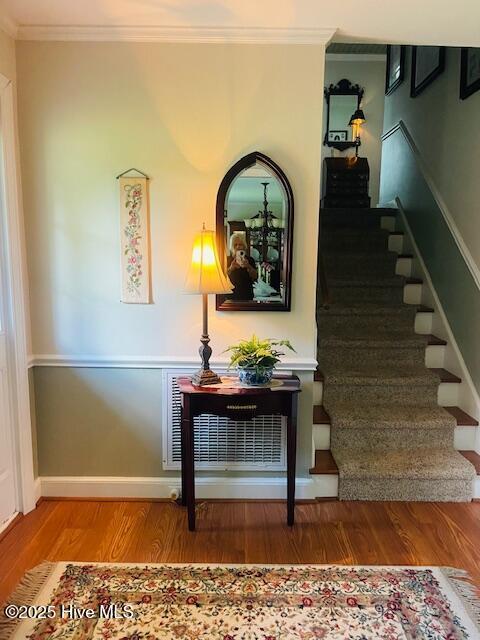 2008 Hardee Rd, Kinston, NC 28504 - stairway with crown molding, wood finished floors, and baseboards