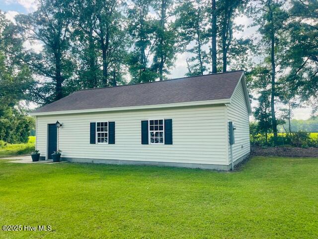 2008 Hardee Rd, Kinston, NC 28504 - view of side of home featuring a yard
