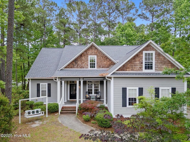 10196 Flint Ct SE, Leland, NC 28451 - view of front of house featuring covered porch and a shingled roof