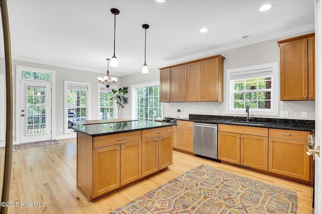 10196 Flint Ct SE, Leland, NC 28451 - kitchen featuring dishwasher, a sink, light wood-style flooring, healthy amount of natural light, and crown molding