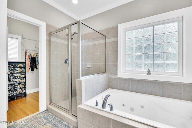 10196 Flint Ct SE, Leland, NC 28451 - bathroom with a shower stall, a tub with jets, plenty of natural light, and ornamental molding