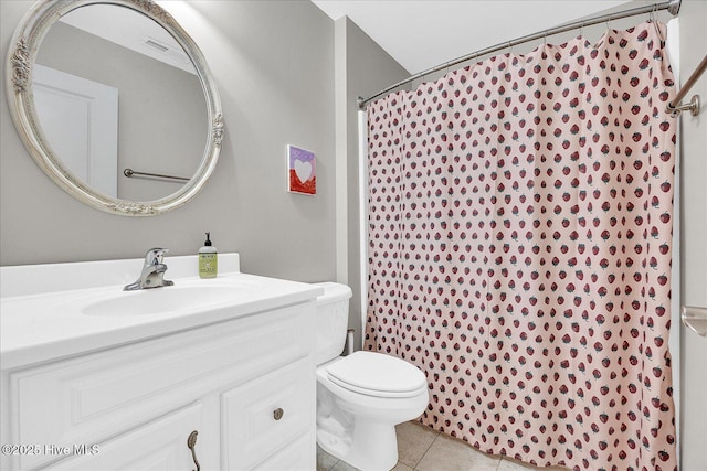 10196 Flint Ct SE, Leland, NC 28451 - bathroom with vanity, tile patterned floors, toilet, and curtained shower