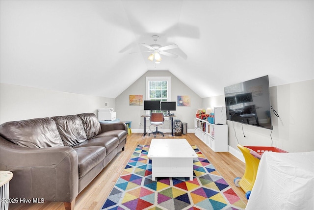 10196 Flint Ct SE, Leland, NC 28451 - living area featuring wood finished floors, vaulted ceiling, a ceiling fan, and baseboards