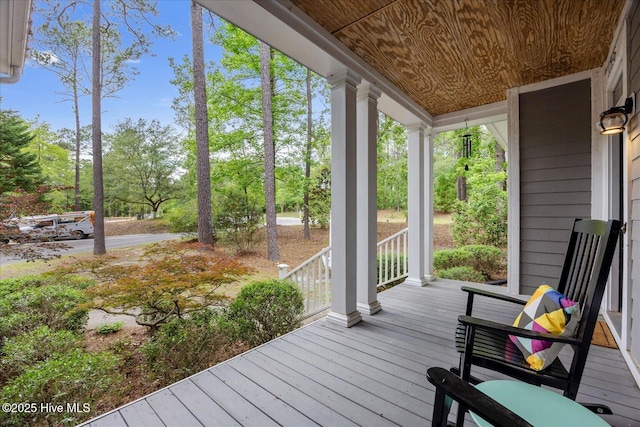 10196 Flint Ct SE, Leland, NC 28451 - porch with view of wooded area