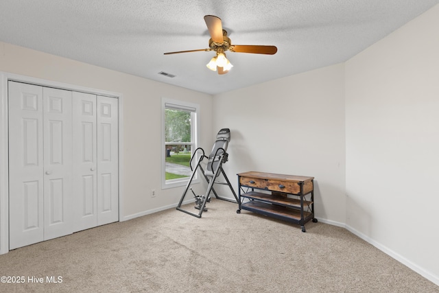 510 Greenfield Pl, Sneads Ferry, NC 28460 - workout area featuring carpet floors, ceiling fan, and baseboards
