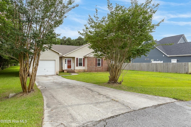 510 Greenfield Pl, Sneads Ferry, NC 28460 - view of front facade with a garage, driveway, and brick siding