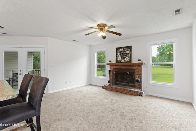 510 Greenfield Pl, Sneads Ferry, NC 28460 - carpeted office with a ceiling fan, a textured ceiling, french doors, baseboards, and a brick fireplace
