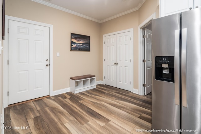 118 Hill Creek Rd, Blounts Creek, NC 27814 - foyer entrance featuring wood finished floors, crown molding, and baseboards