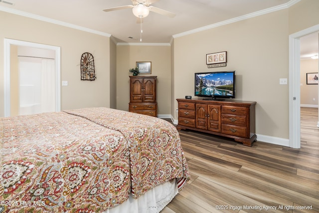 118 Hill Creek Rd, Blounts Creek, NC 27814 - bedroom with ornamental molding, wood finished floors, baseboards, and a ceiling fan