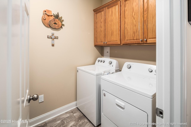 118 Hill Creek Rd, Blounts Creek, NC 27814 - laundry area with washer and dryer, cabinet space, and baseboards
