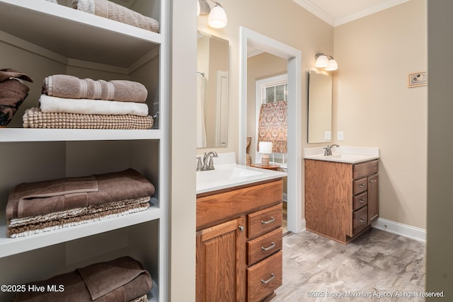118 Hill Creek Rd, Blounts Creek, NC 27814 - bathroom featuring ornamental molding, two vanities, marble look tiles, and baseboards
