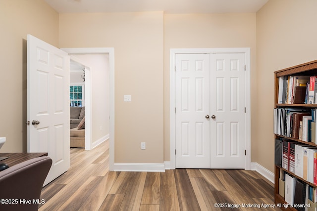 118 Hill Creek Rd, Blounts Creek, NC 27814 - unfurnished bedroom featuring wood finished floors, baseboards, and a closet