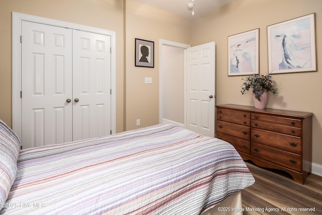 118 Hill Creek Rd, Blounts Creek, NC 27814 - bedroom featuring a closet, wood finished floors, and baseboards