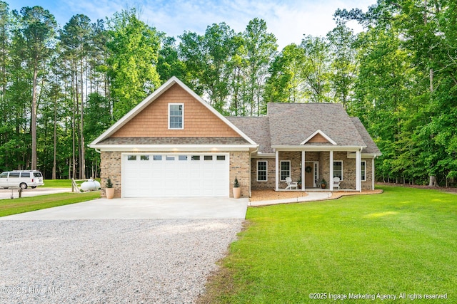 118 Hill Creek Rd, Blounts Creek, NC 27814 - craftsman-style home with driveway, a front lawn, covered porch, brick siding, and a shingled roof