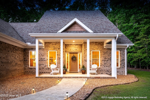 118 Hill Creek Rd, Blounts Creek, NC 27814 - view of front of property with covered porch and a shingled roof