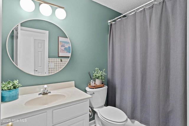 415 Point View Ct, Wilmington, NC 28411 - bathroom with toilet, vanity, a textured ceiling, and a shower with curtain