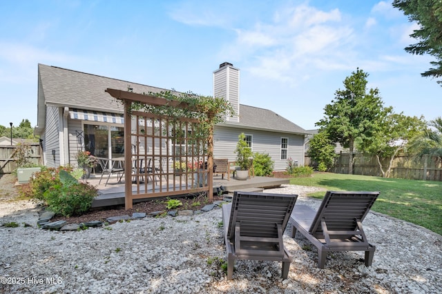415 Point View Ct, Wilmington, NC 28411 - back of property featuring a deck, roof with shingles, and a chimney