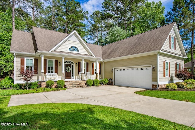 4010 Sienna Trl, New Bern, NC 28562 - greek revival house featuring covered porch, concrete driveway, a shingled roof, and a front lawn
