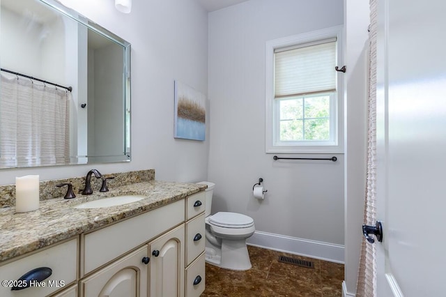 4010 Sienna Trl, New Bern, NC 28562 - bathroom with vanity, toilet, baseboards, a shower with shower curtain, and tile patterned floors