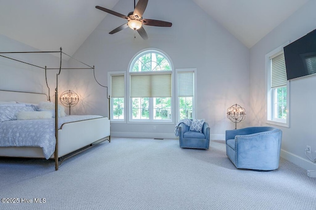 4010 Sienna Trl, New Bern, NC 28562 - carpeted bedroom with multiple windows, baseboards, high vaulted ceiling, and ceiling fan