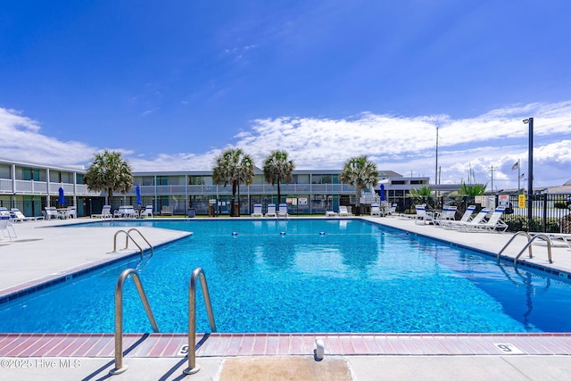1918 W Fort Macon Rd Unit 205Bogue, Shores Condominium, Atlantic Beach, NC 28512 - community pool featuring a patio