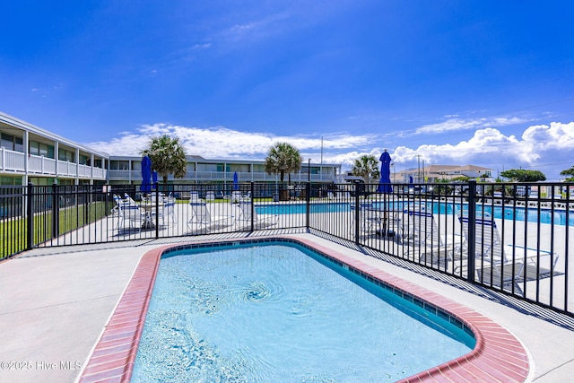 1918 W Fort Macon Rd Unit 205Bogue, Shores Condominium, Atlantic Beach, NC 28512 - community pool with a patio area