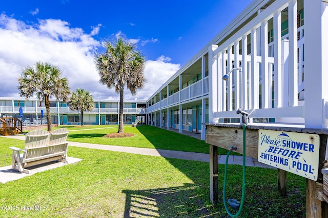 1918 W Fort Macon Rd Unit 205Bogue, Shores Condominium, Atlantic Beach, NC 28512 - view of property's community featuring a yard