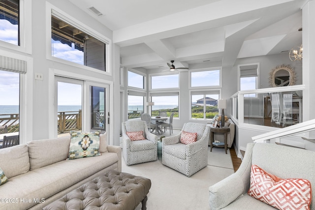 301 Salter Path Rd Unit 72Genesis, Pine Knoll Shores, NC 28512 - sunroom / solarium featuring a water view, coffered ceiling, beam ceiling, and a high ceiling