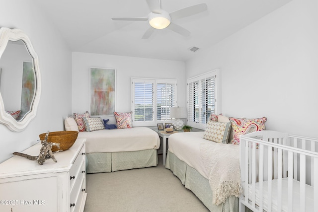 301 Salter Path Rd Unit 72Genesis, Pine Knoll Shores, NC 28512 - bedroom with light colored carpet and ceiling fan