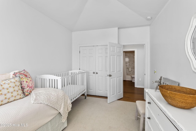 301 Salter Path Rd Unit 72Genesis, Pine Knoll Shores, NC 28512 - bedroom featuring a closet and light carpet