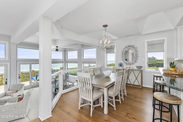 301 Salter Path Rd Unit 72Genesis, Pine Knoll Shores, NC 28512 - dining room featuring healthy amount of natural light, light wood-type flooring, and ceiling fan