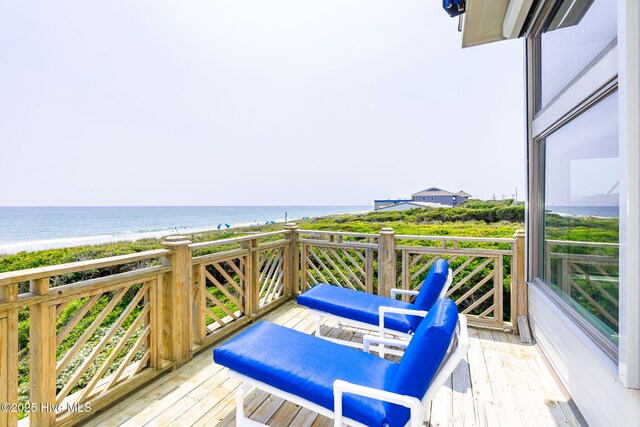 301 Salter Path Rd Unit 72Genesis, Pine Knoll Shores, NC 28512 - wooden deck featuring a water view