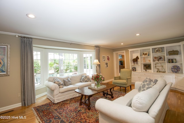 7 Saddle Pl, Pinehurst, NC 28374 - living room with crown molding, light wood-type flooring, and recessed lighting