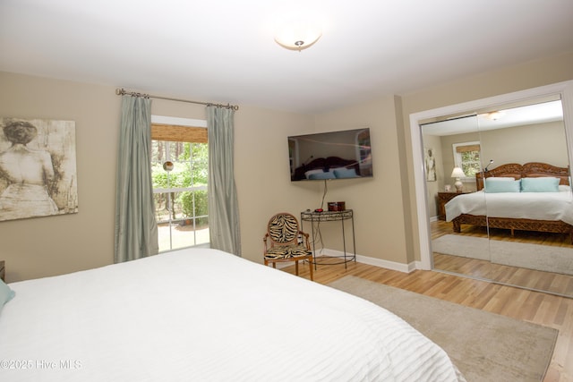 7 Saddle Pl, Pinehurst, NC 28374 - bedroom featuring wood finished floors and a closet