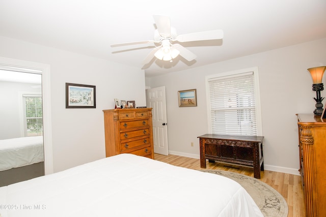7 Saddle Pl, Pinehurst, NC 28374 - bedroom featuring light wood-type flooring and ceiling fan