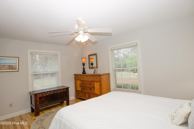 7 Saddle Pl, Pinehurst, NC 28374 - bedroom with light wood-style flooring and ceiling fan