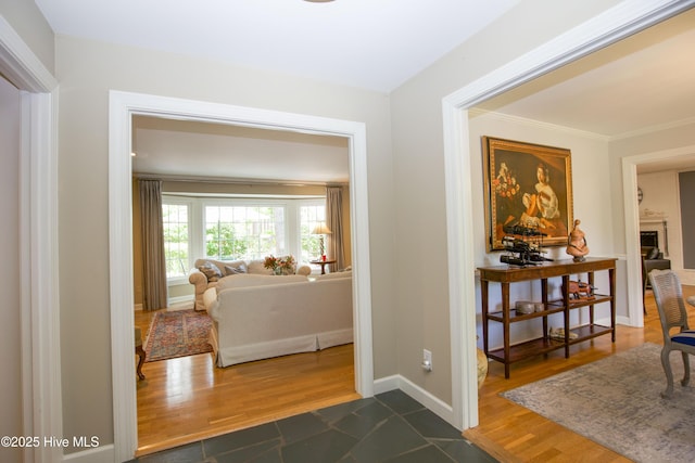 7 Saddle Pl, Pinehurst, NC 28374 - corridor featuring crown molding and dark wood-style floors