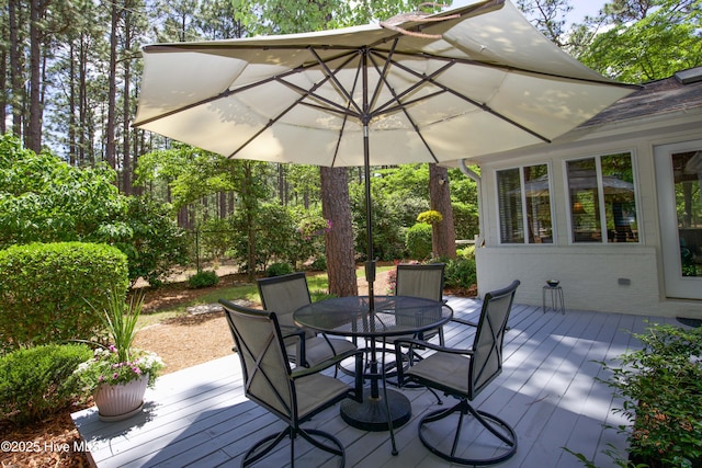 7 Saddle Pl, Pinehurst, NC 28374 - wooden deck with outdoor dining area