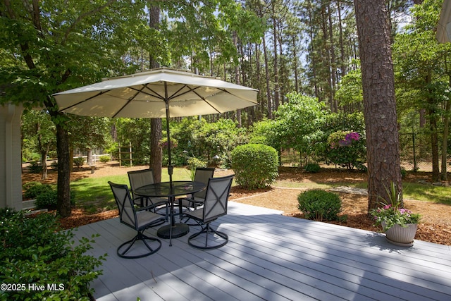 7 Saddle Pl, Pinehurst, NC 28374 - wooden terrace with outdoor dining area