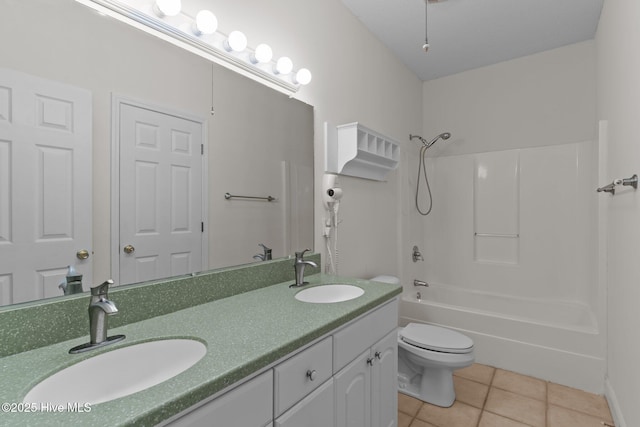 3665 Willow Lake Dr SE, Southport, NC 28461 - bathroom featuring toilet, tile patterned flooring, double vanity, and shower / bath combination
