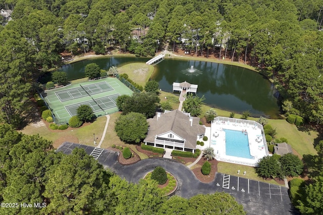 3665 Willow Lake Dr SE, Southport, NC 28461 - view of property location featuring a nearby body of water, a heavily wooded area, and a pool area