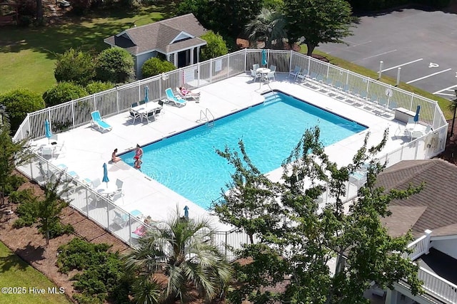 3665 Willow Lake Dr SE, Southport, NC 28461 - community pool with a patio area